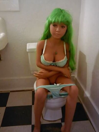 Nina on the crapper