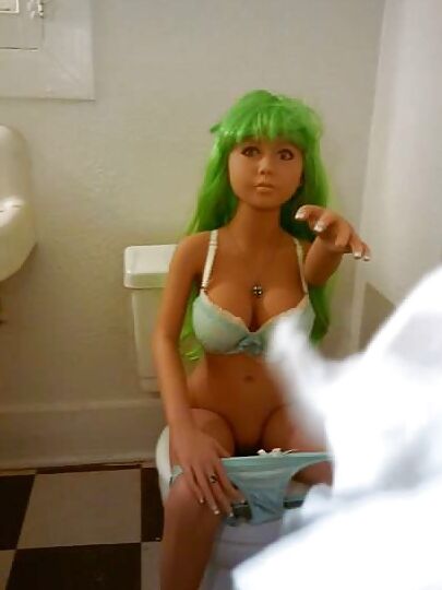 Nina on the crapper
