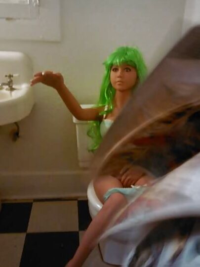 Nina on the crapper