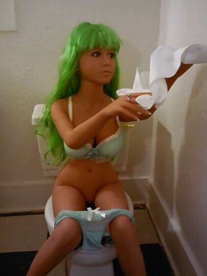 Nina on the crapper