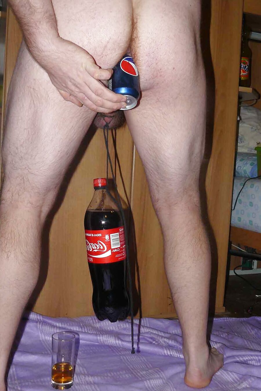 Balls torture with bottle
