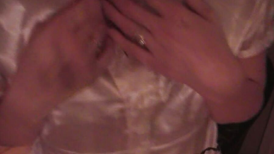 White satin bloluse, pink satin panties and black stockings