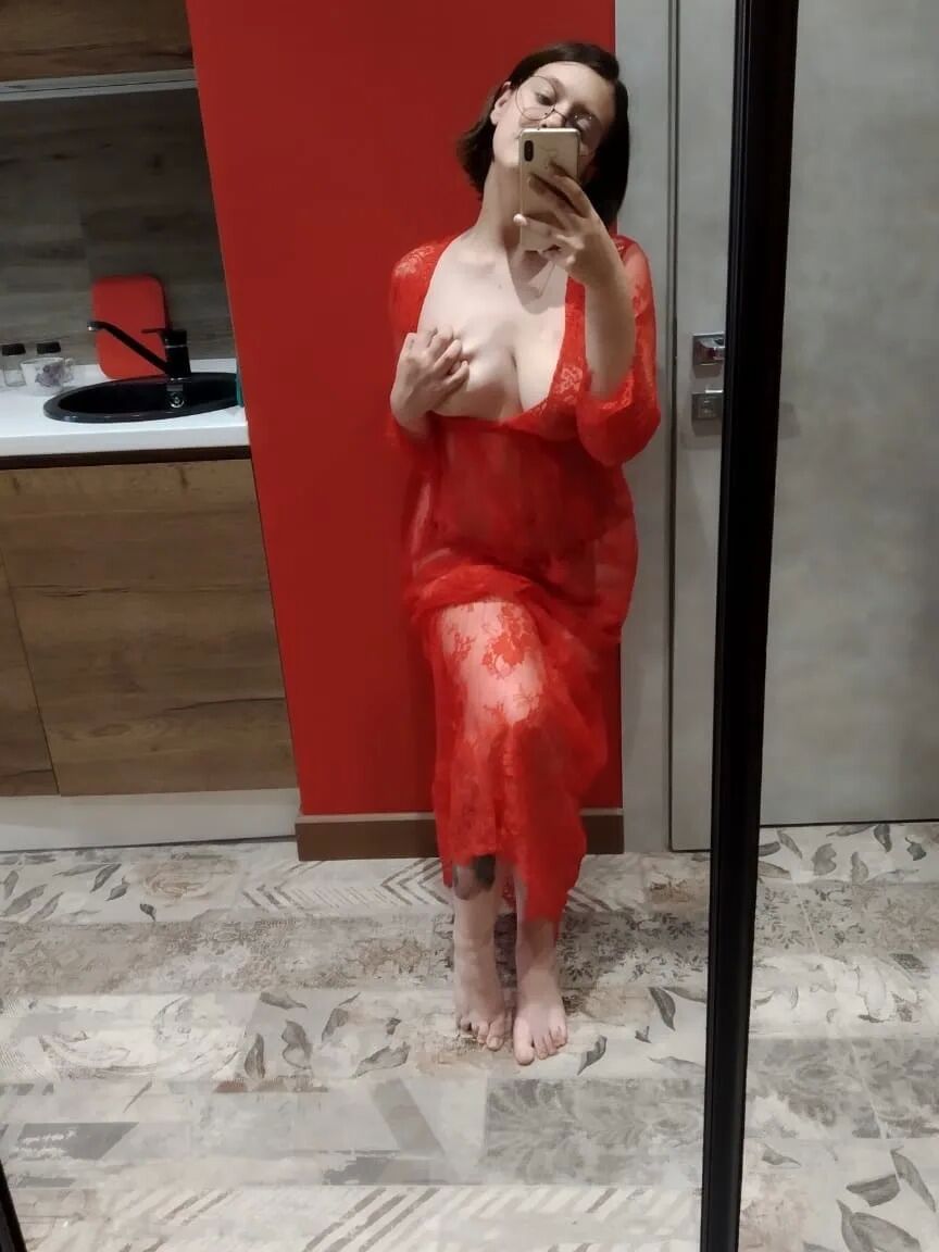 Natural busty babe loves to tease in lingerie