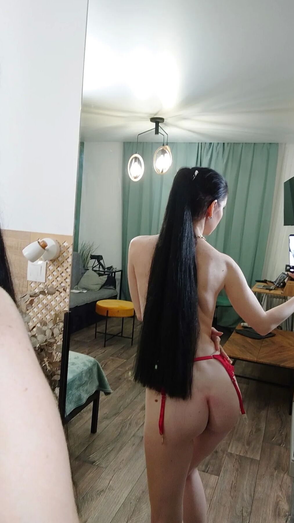 Sexy teacher taking some naughty photos for you