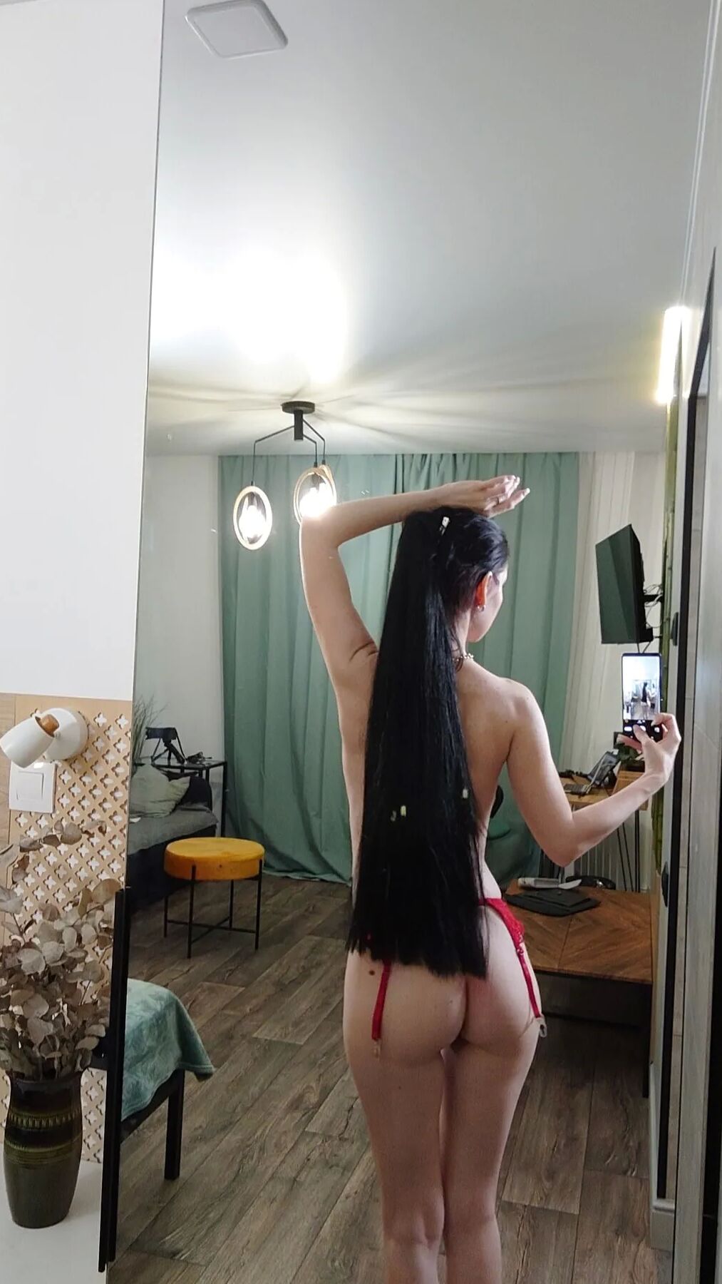 Sexy teacher taking some naughty photos for you