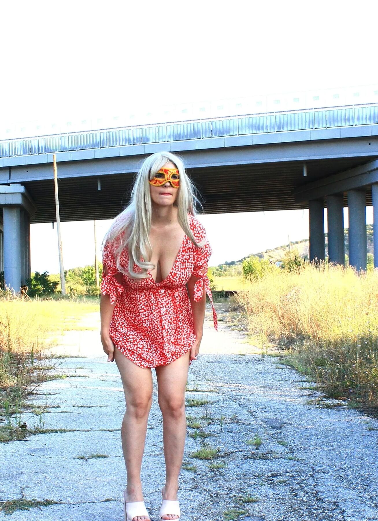 Blonde bitch dancing naked in front of the train