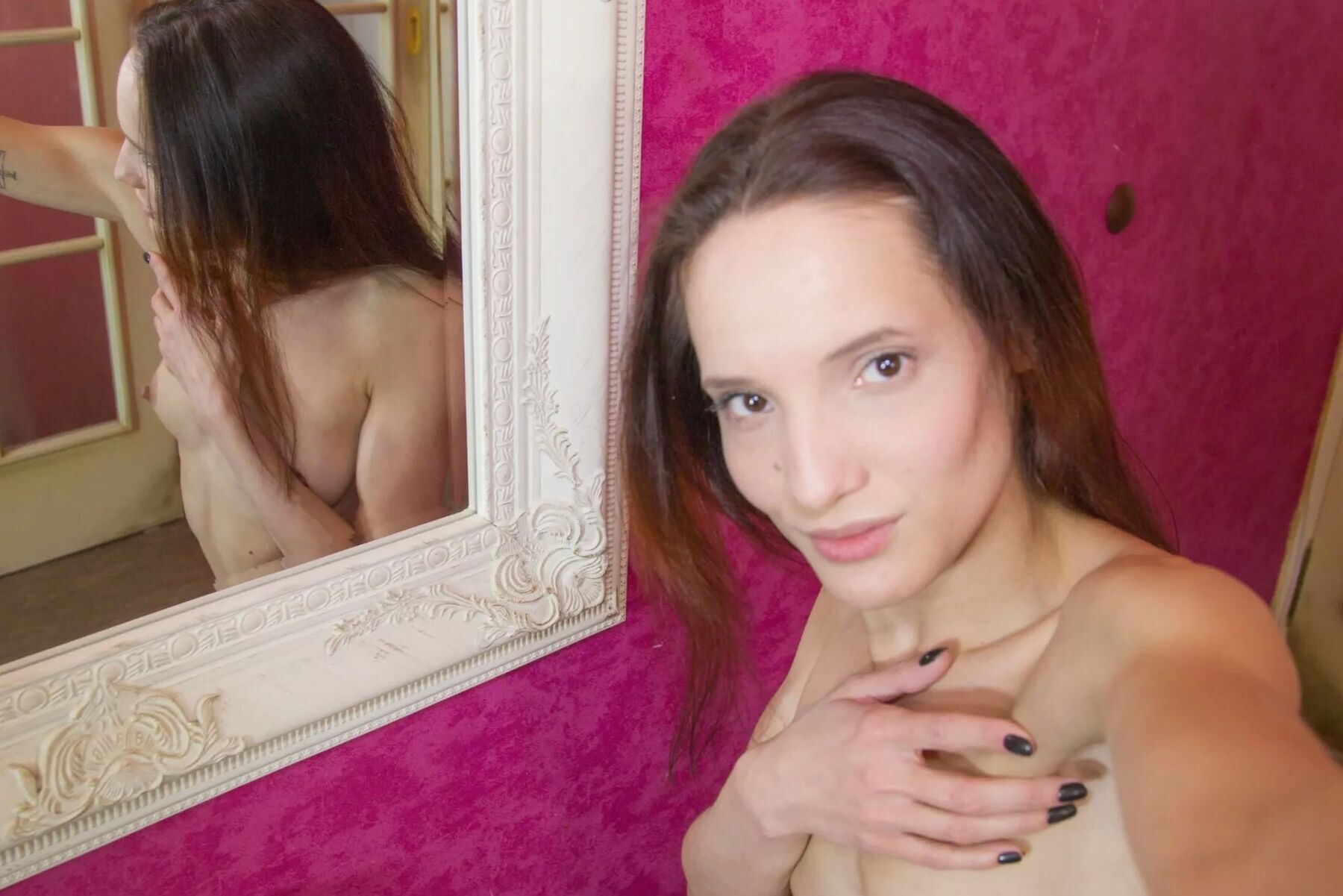Skinny teen shows her small tits on camera