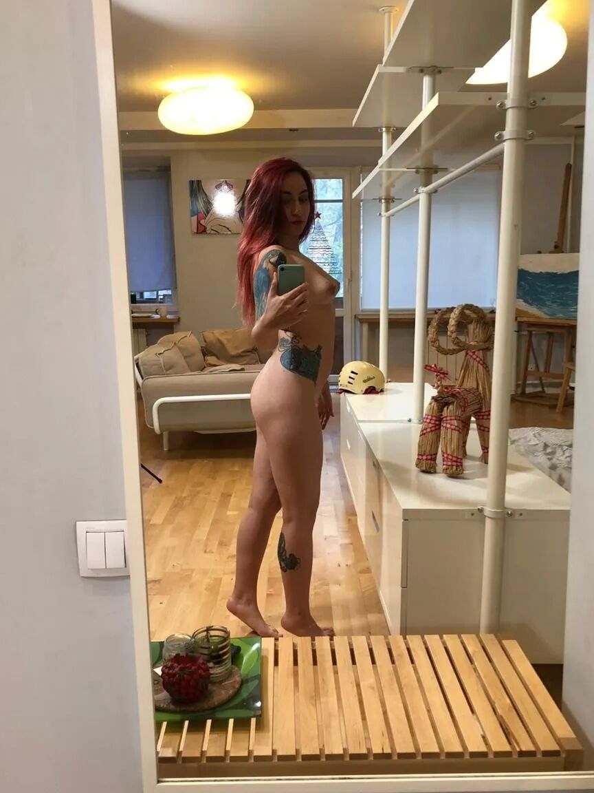 Redhead with nice tits and sexy tattoos
