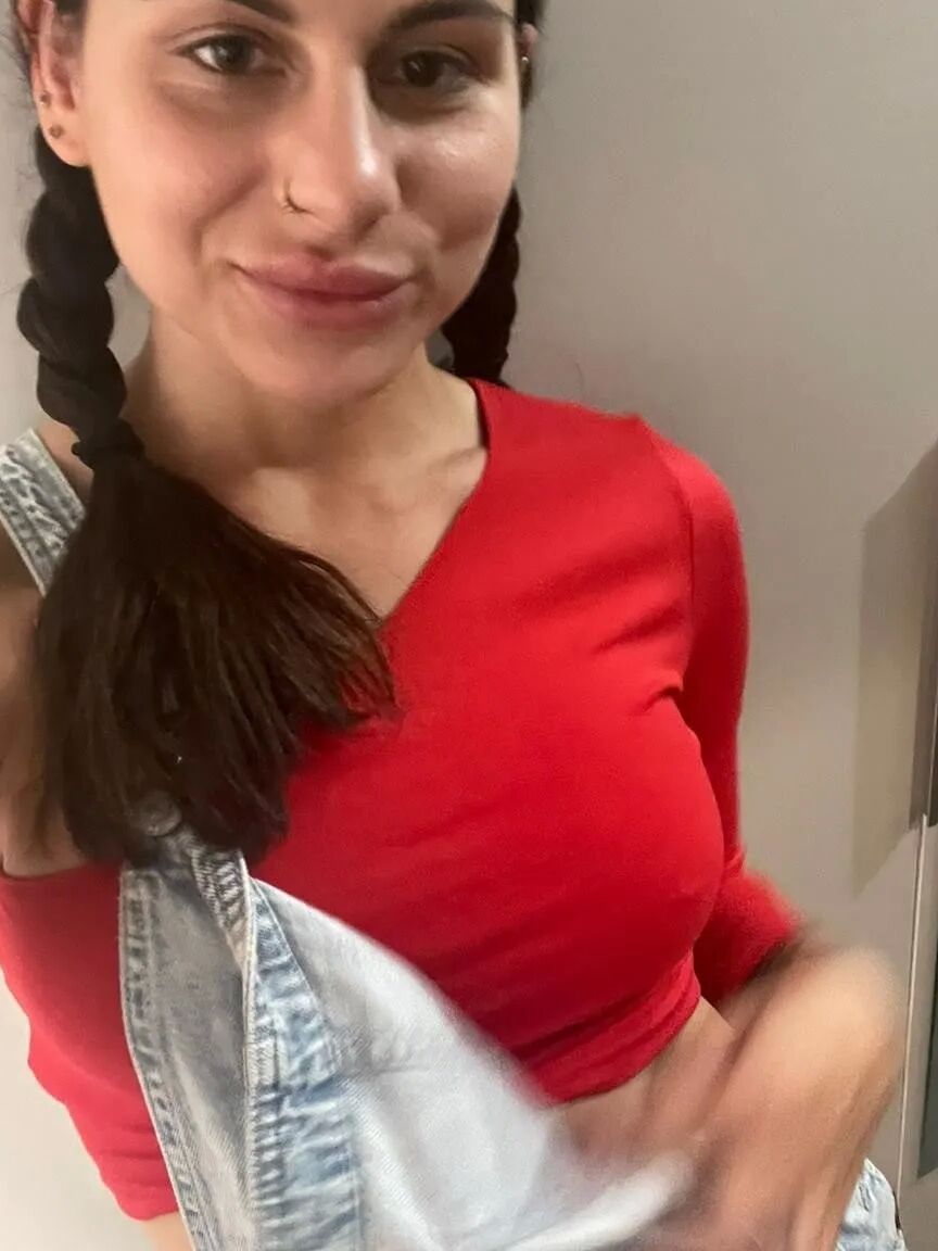 Sexy girl in red gets naked for you