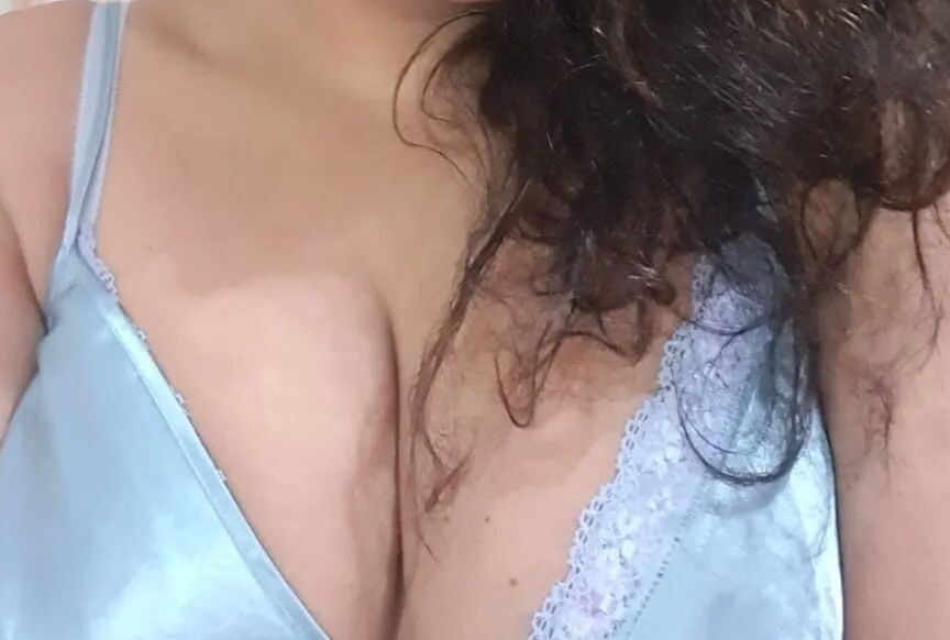 Goddess in sexy blue satin dress
