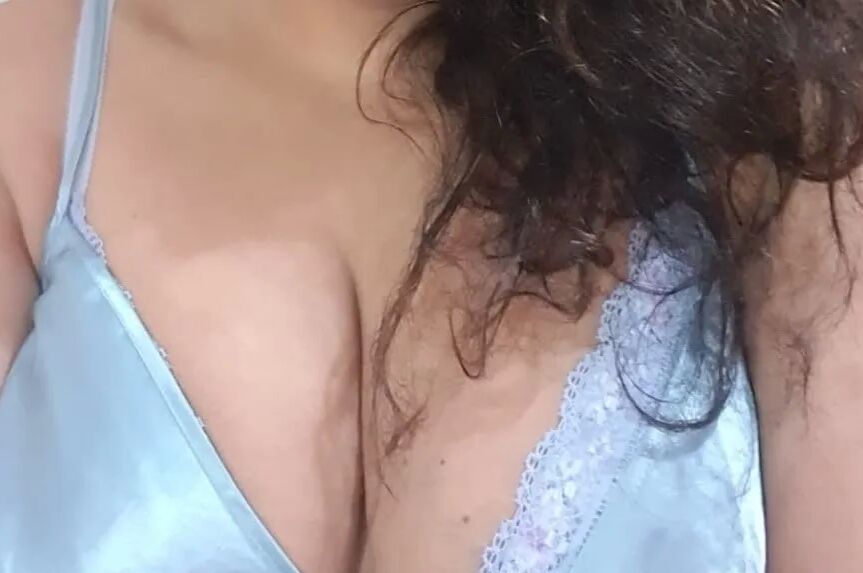 Goddess in sexy blue satin dress