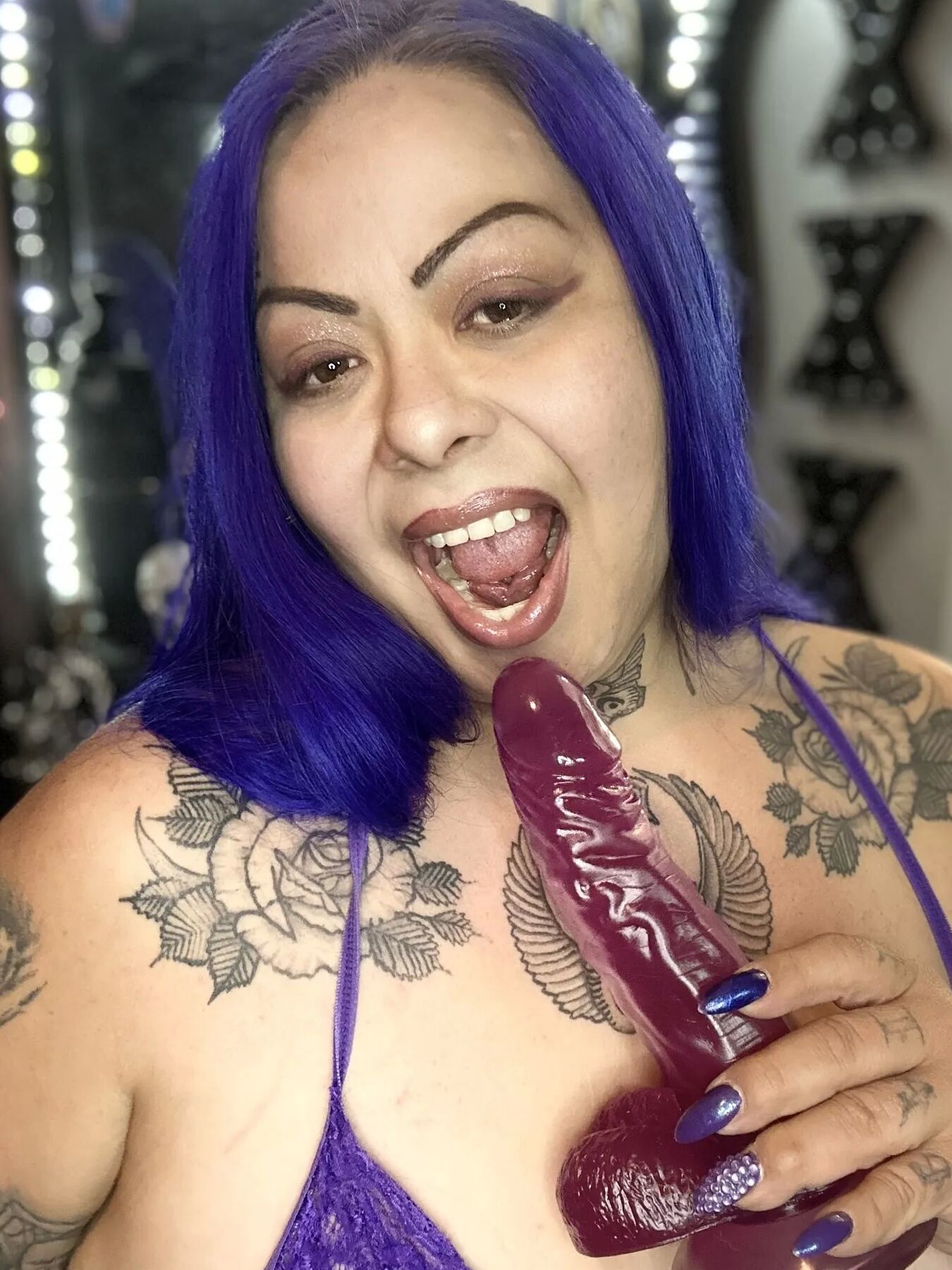 Purple dildo eater