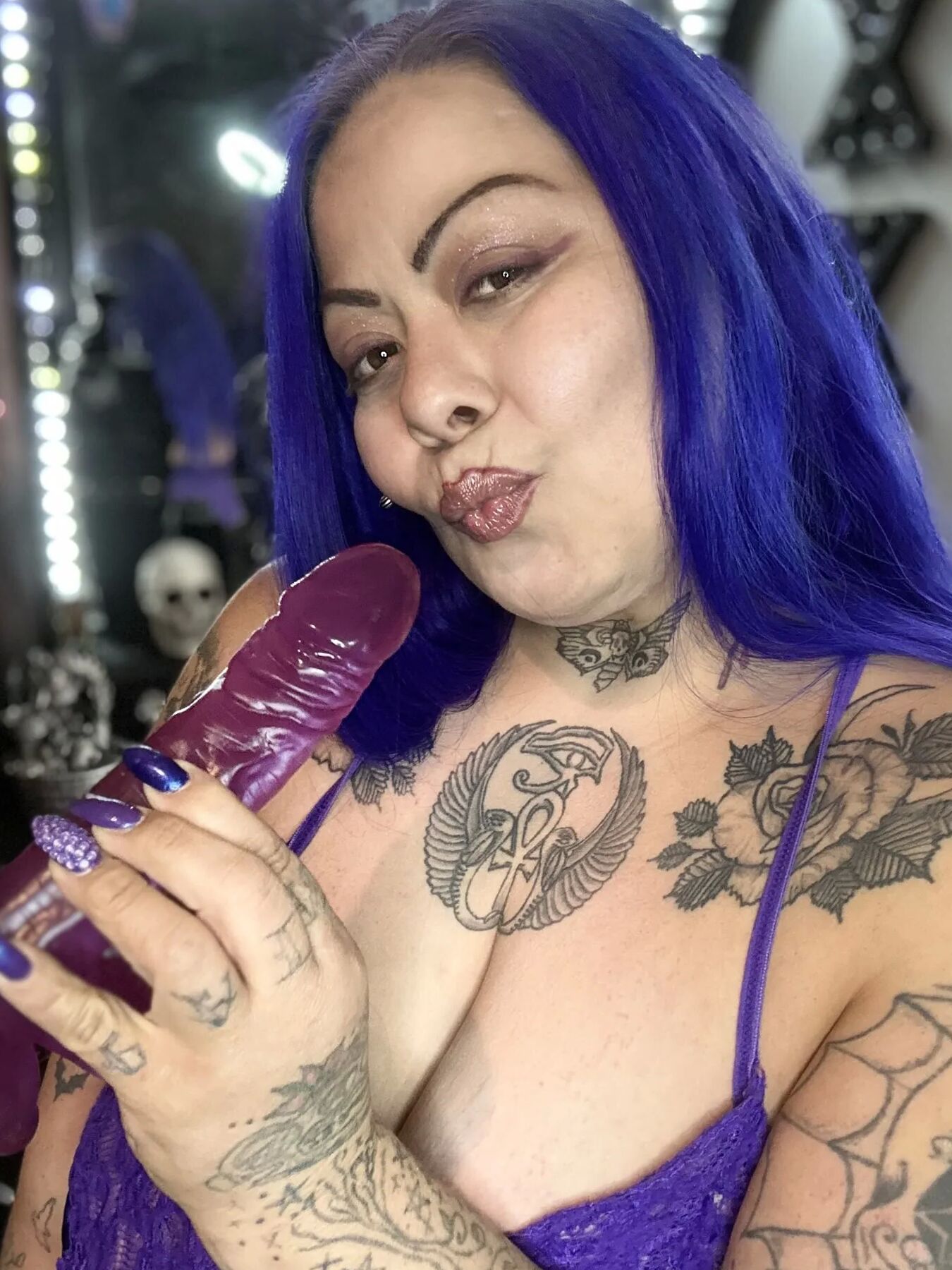 Purple dildo eater