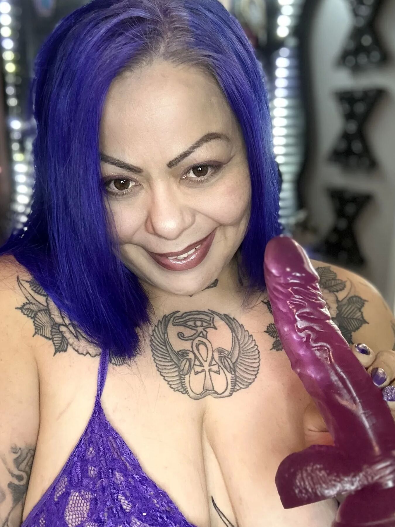 Purple dildo eater