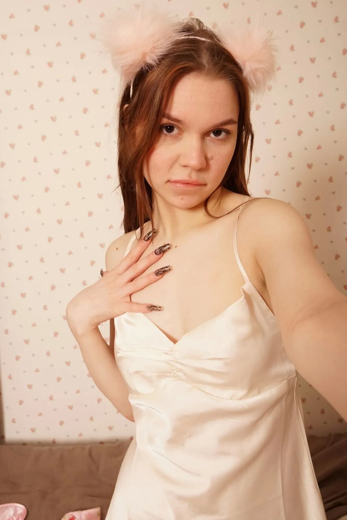 Desirable redhead babe posing in hot selfies
