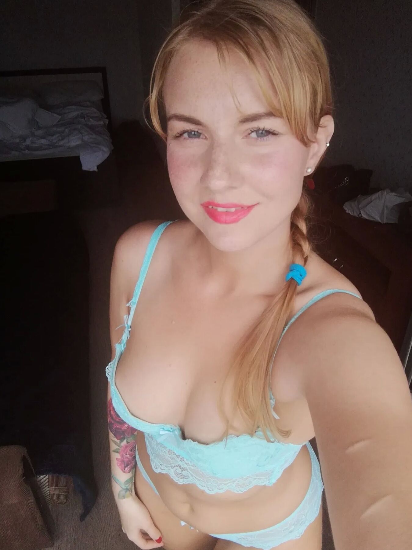 Blue lingerie beauty shows off her curves