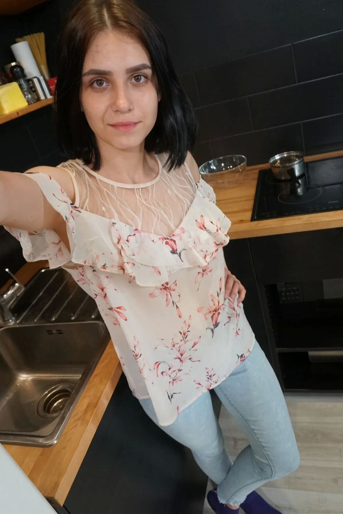 Pale cutie with a tattoo undressing passionately