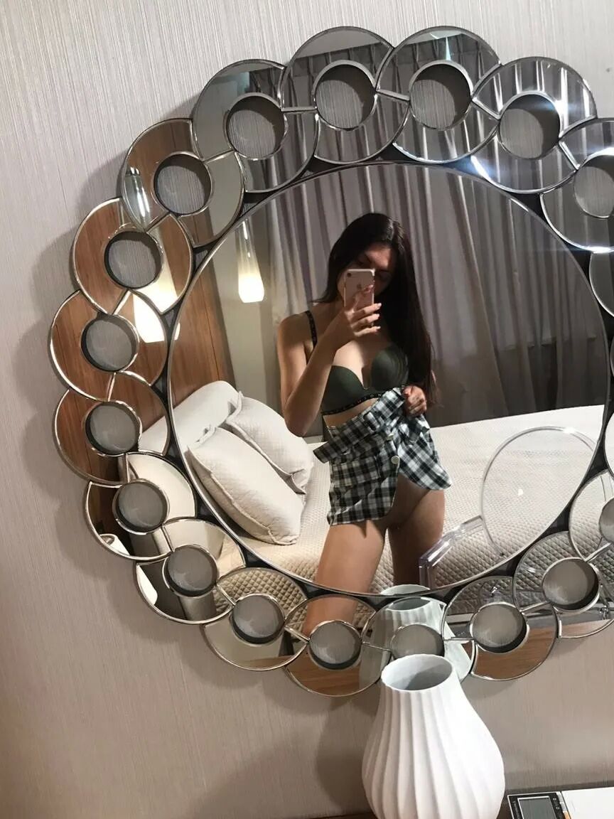 Undressing and taking selfies after college classes