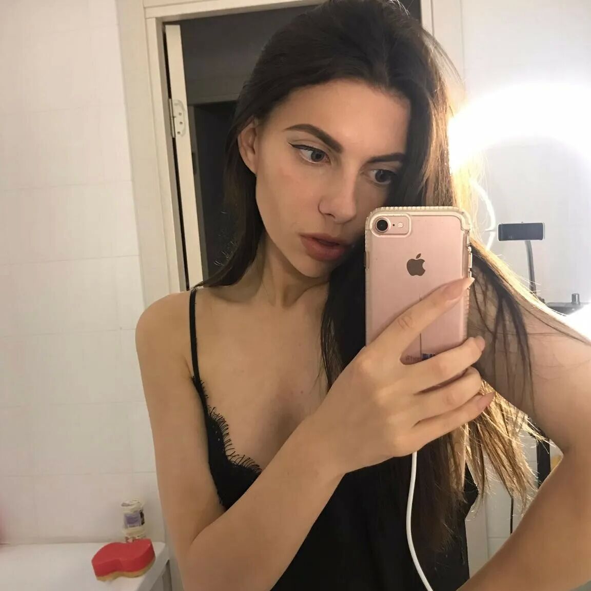 Undressing and taking selfies after college classes