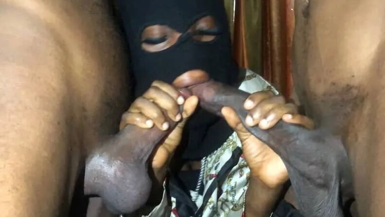 Sucking two big nigerian dicks together