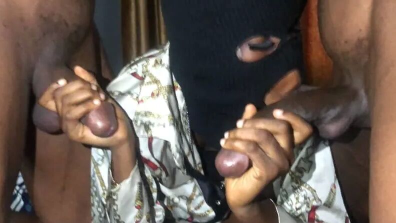 Sucking two big nigerian dicks together