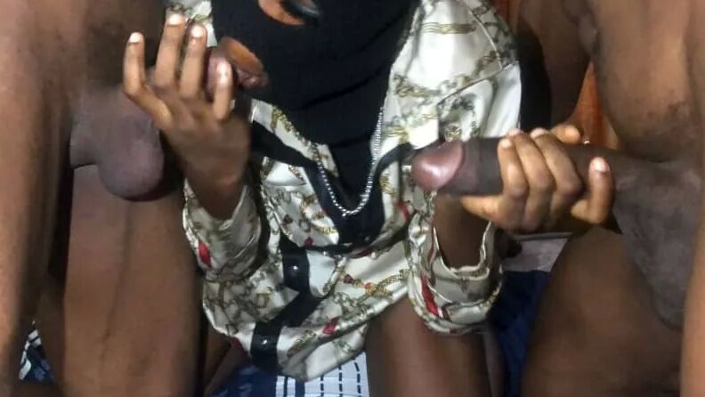 Sucking two big nigerian dicks together
