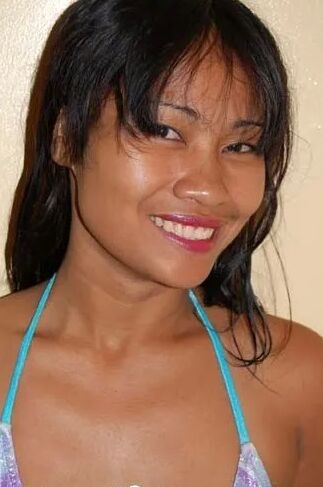 Naughty Asian babe teasing in a bikini