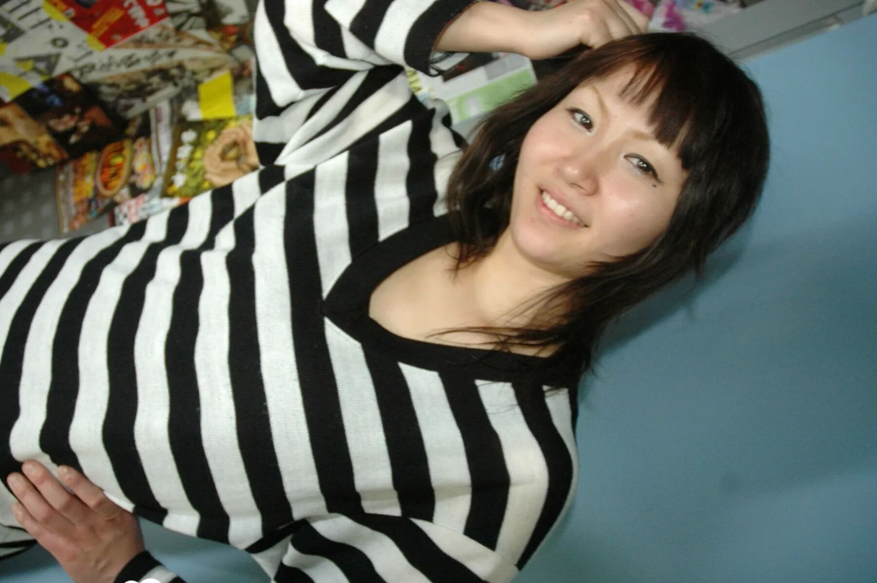 Hot Asian strips pantyhose and does sexy poses