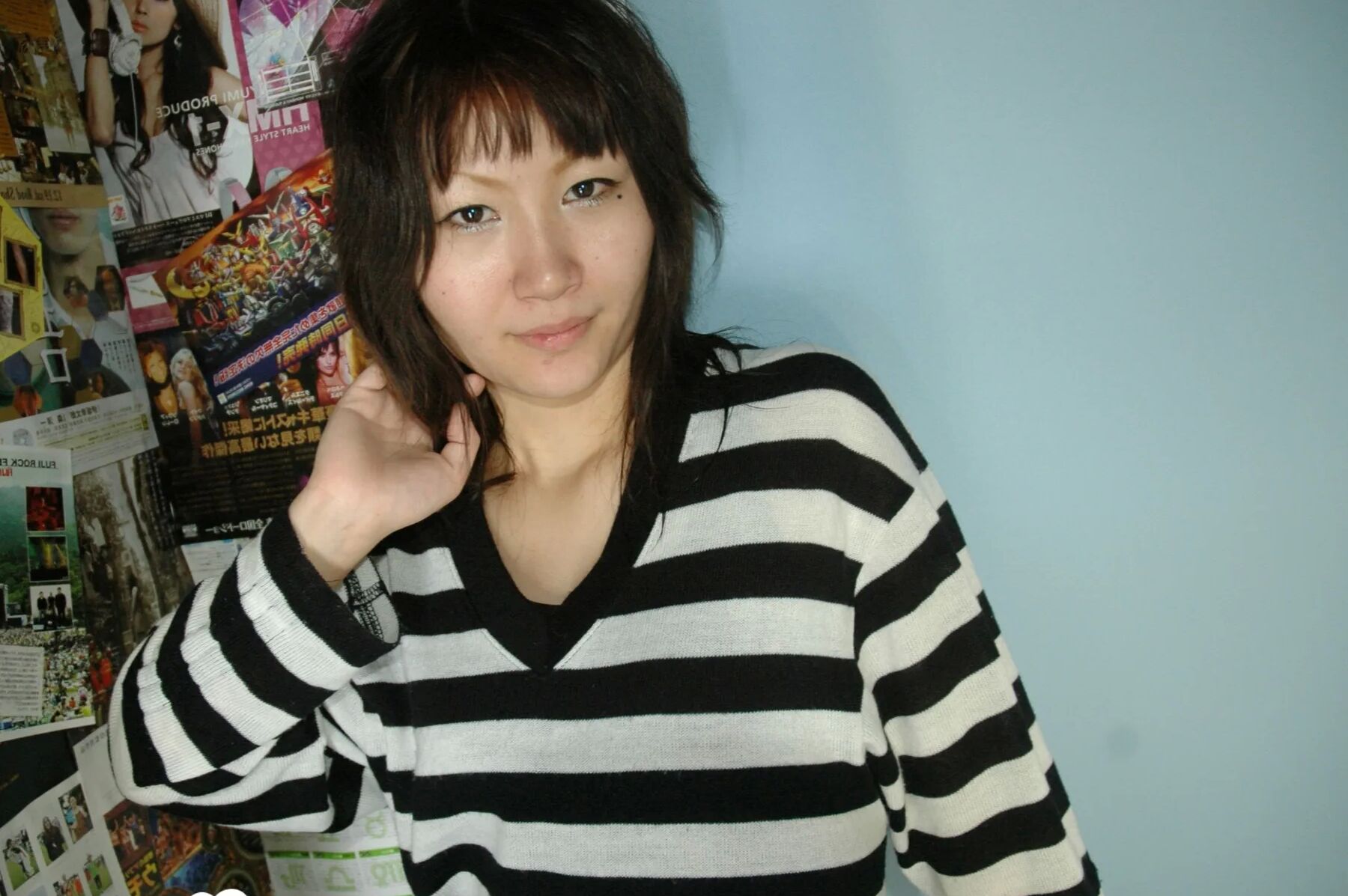 Hot Asian strips pantyhose and does sexy poses