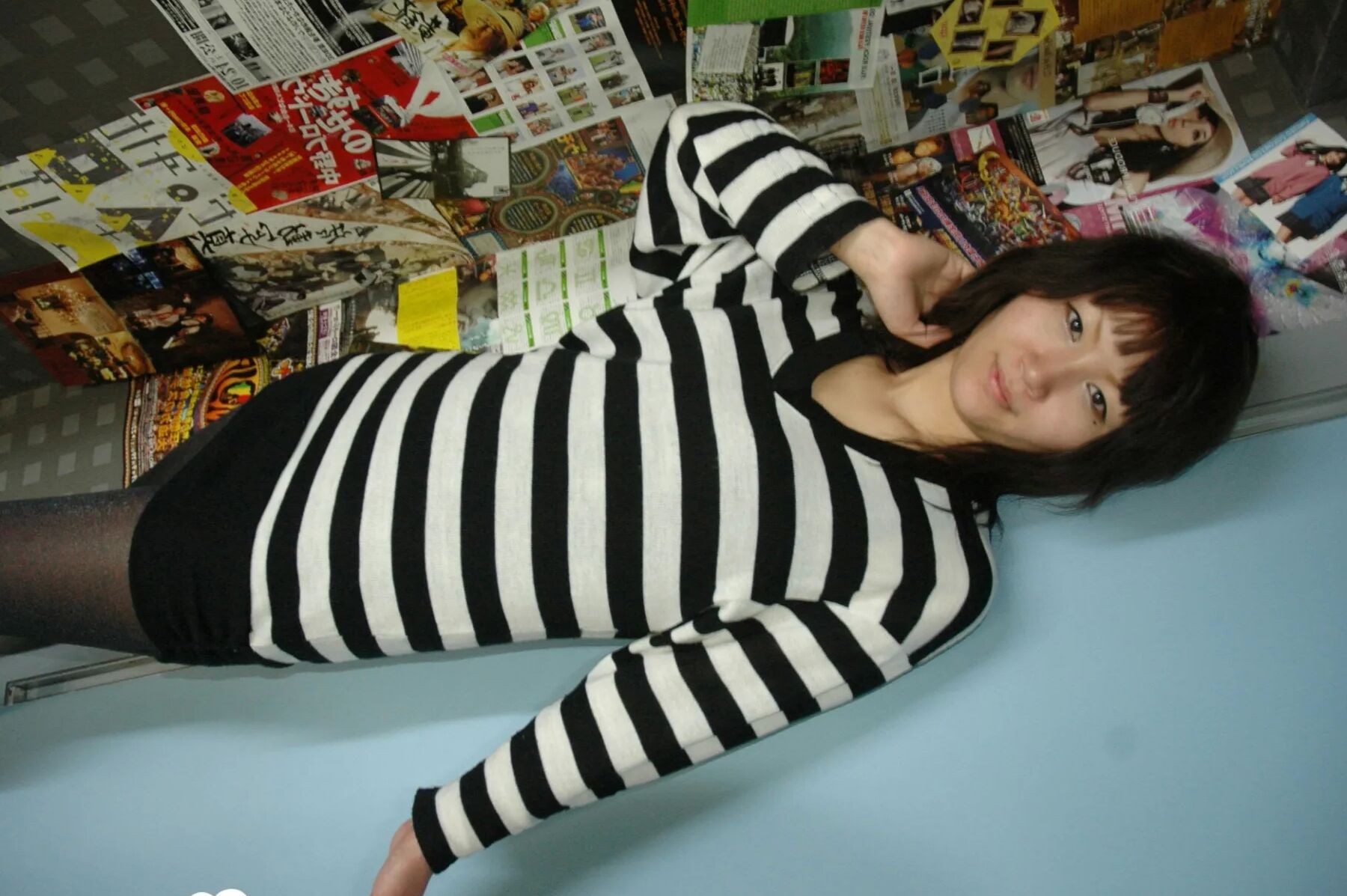 Hot Asian strips pantyhose and does sexy poses