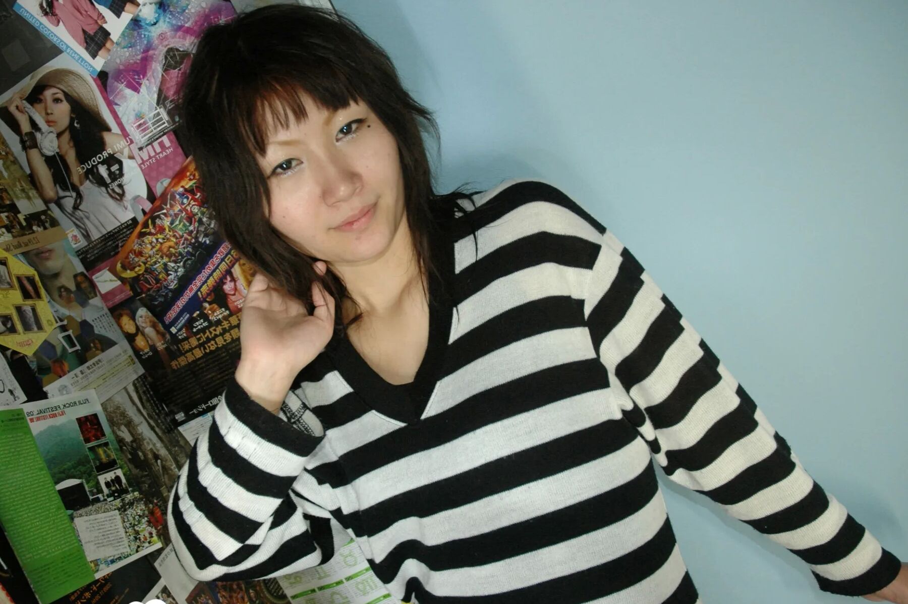 Hot Asian strips pantyhose and does sexy poses