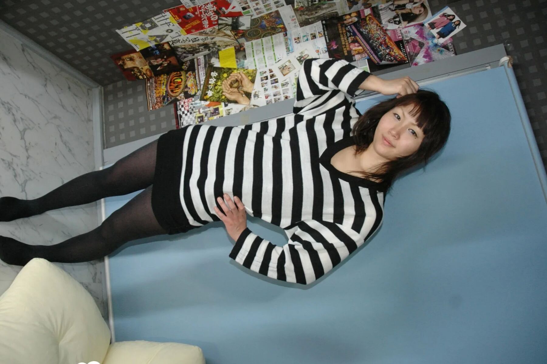 Hot Asian strips pantyhose and does sexy poses