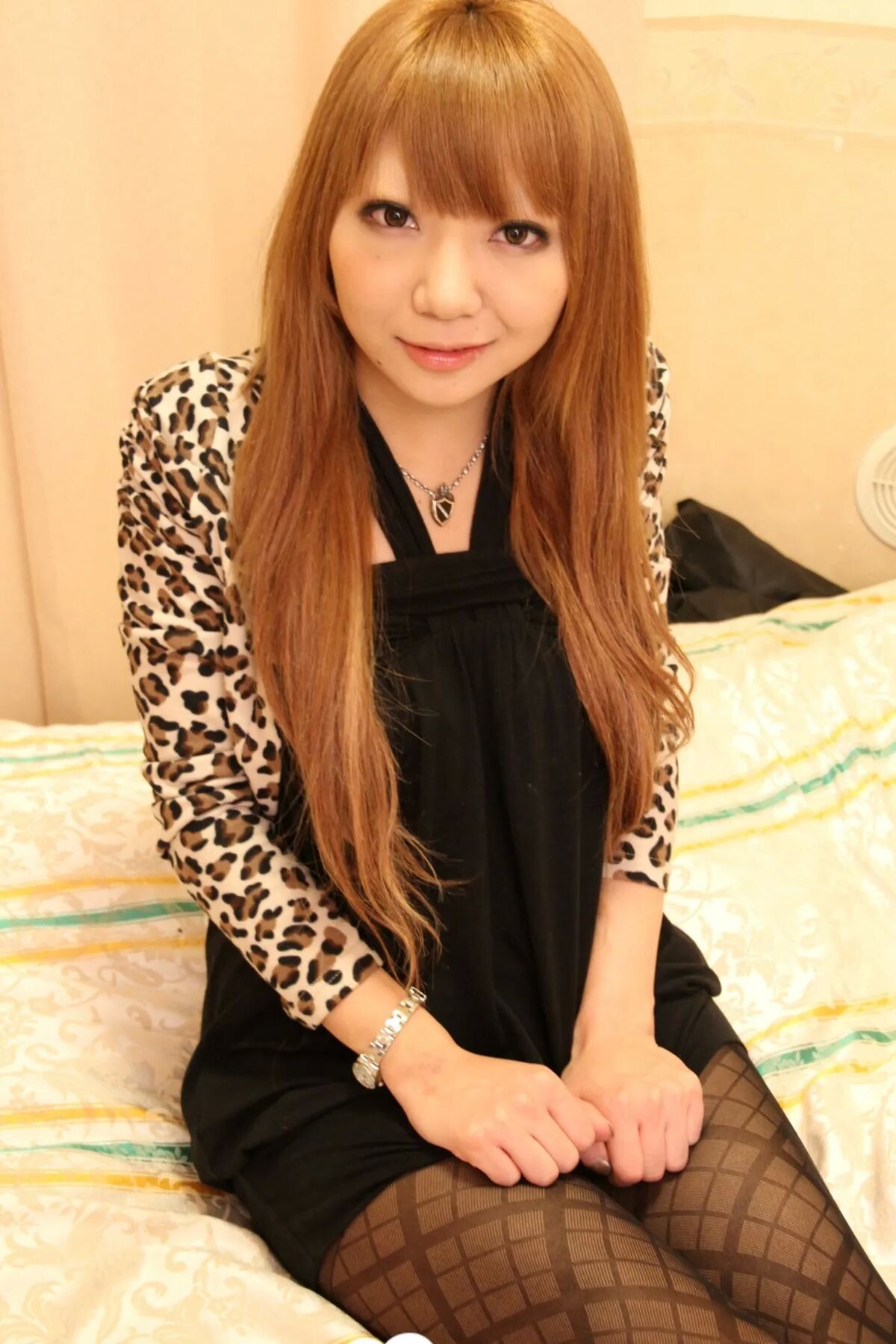 Redhead Asian in pantyhose goes wild on camera