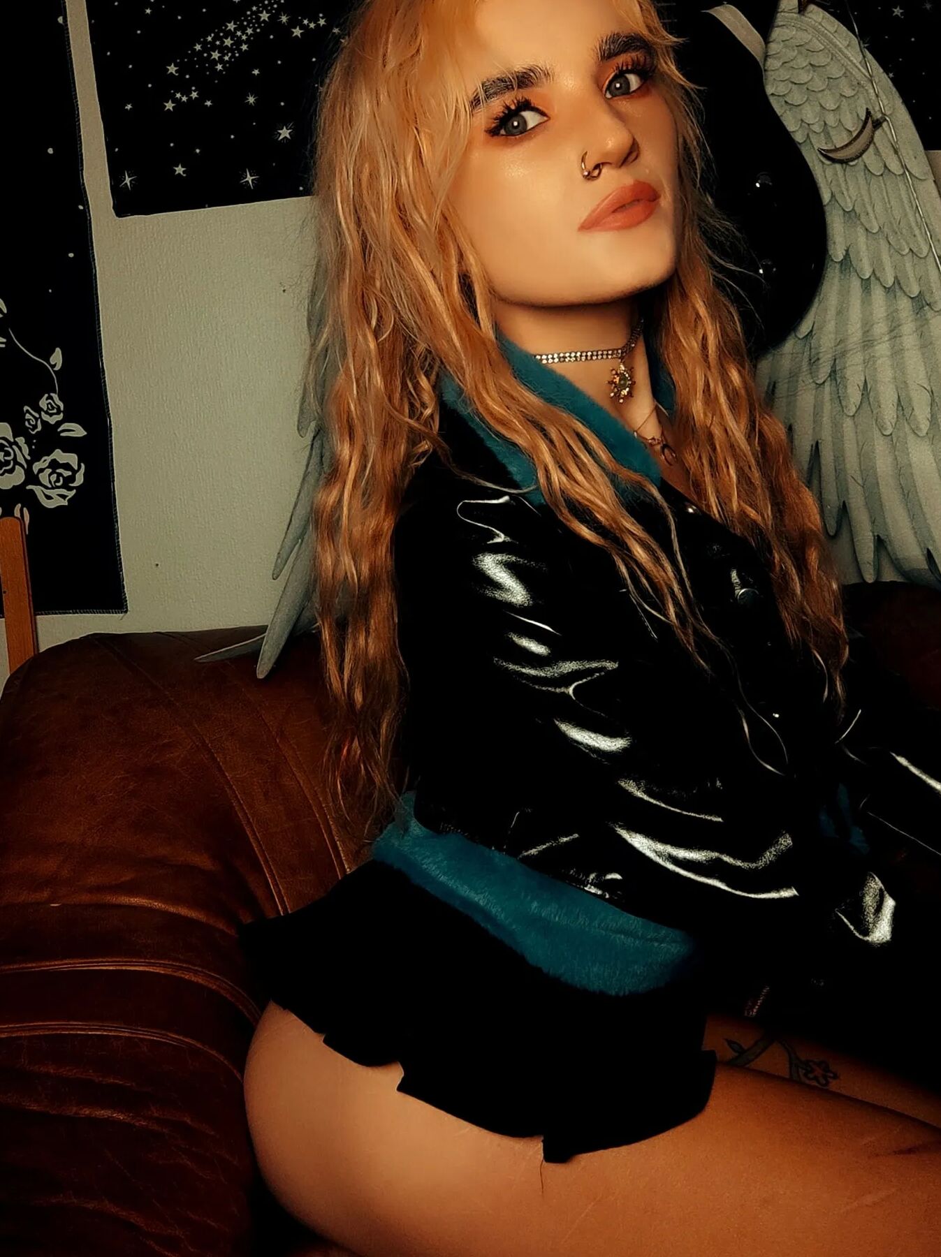 Blondie taking off her panties and bra. Wears a tiny skirt