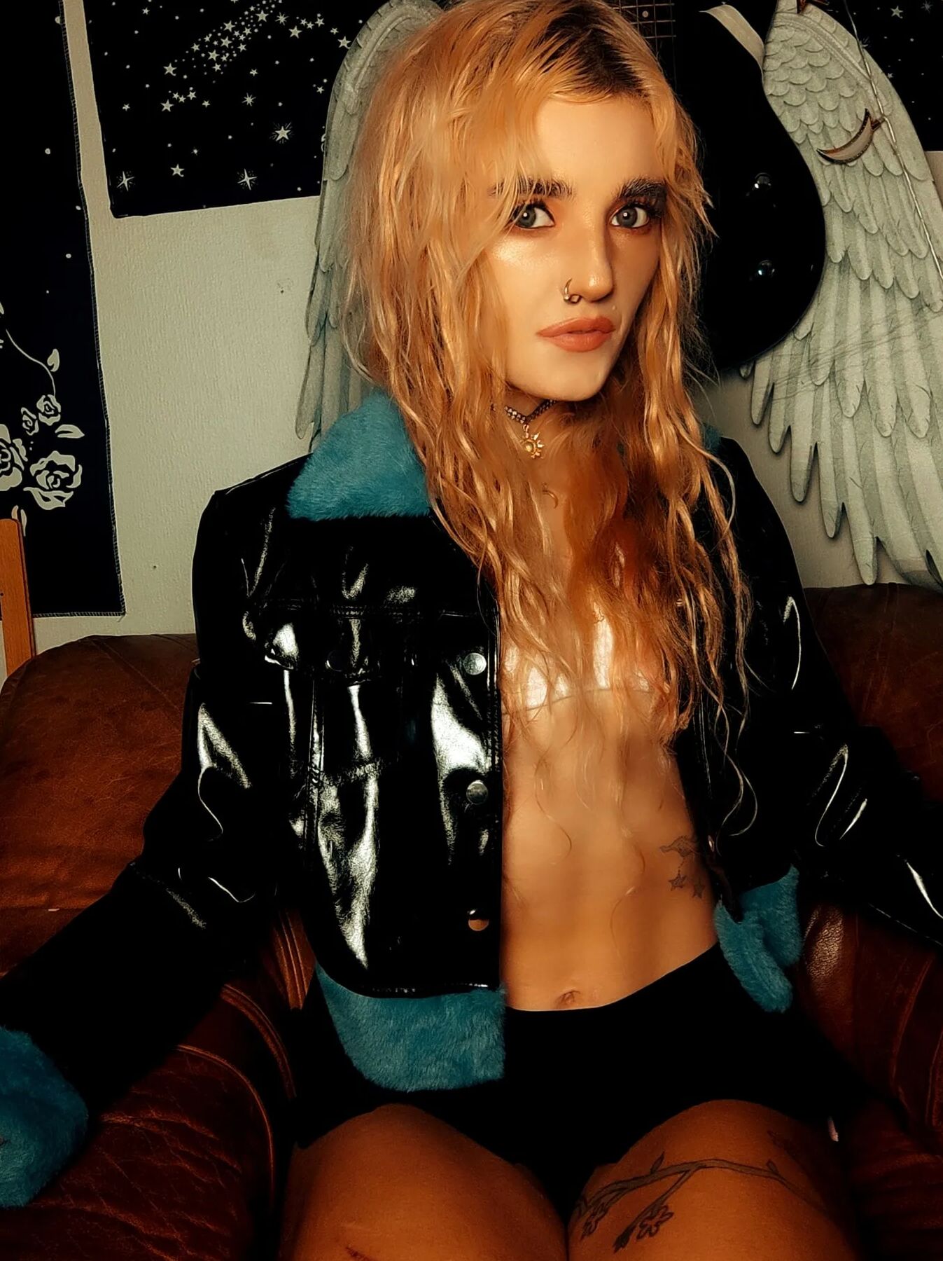 Blondie taking off her panties and bra. Wears a tiny skirt