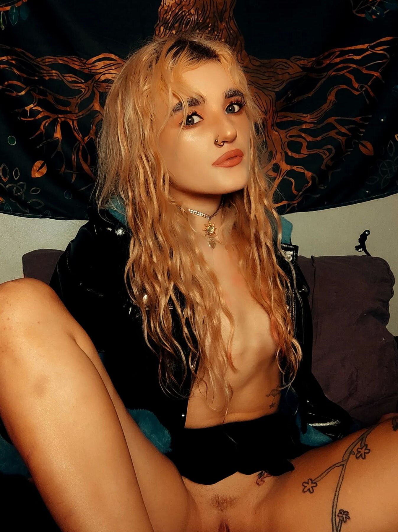 Blondie taking off her panties and bra. Wears a tiny skirt