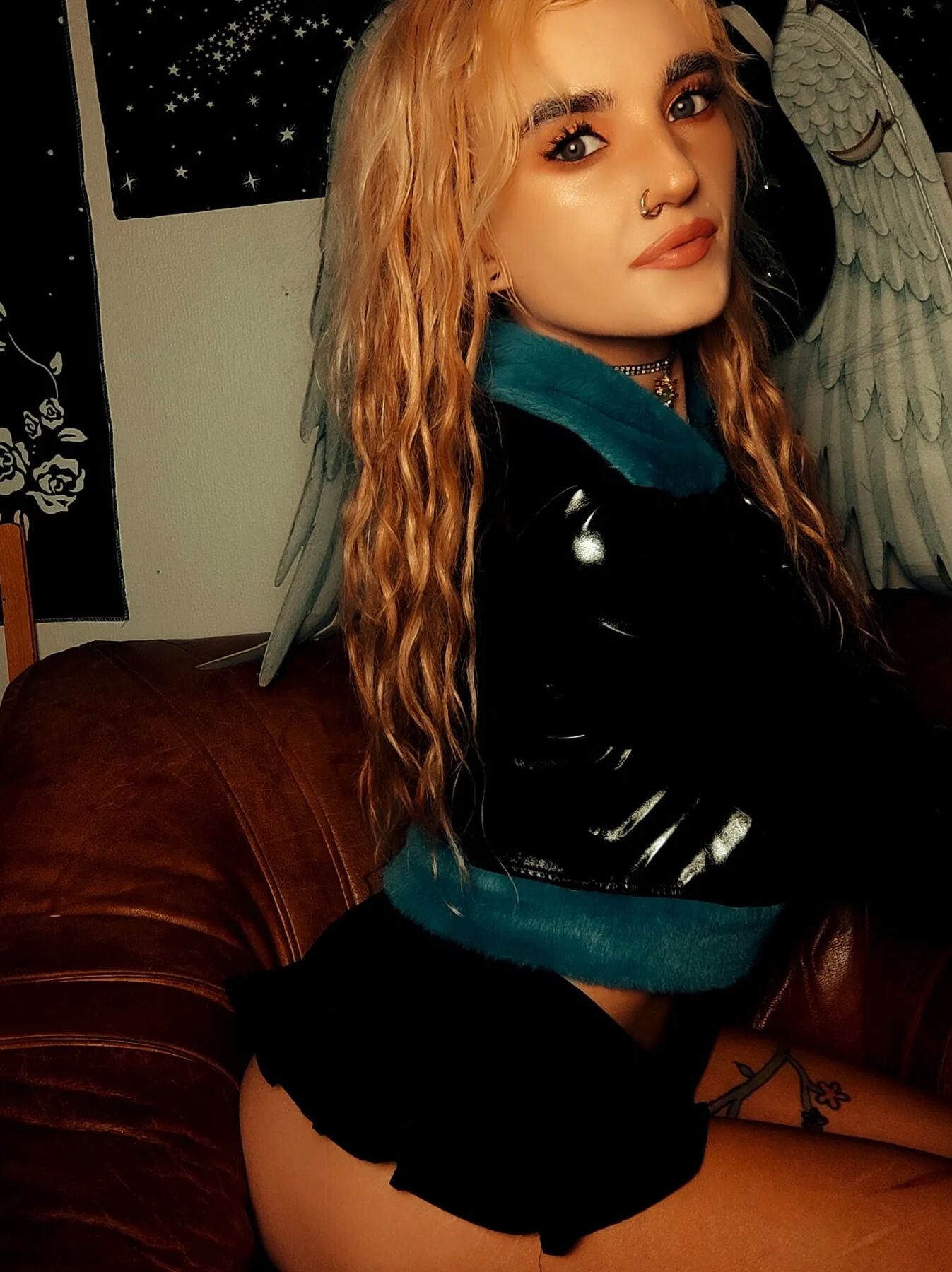 Blondie taking off her panties and bra. Wears a tiny skirt