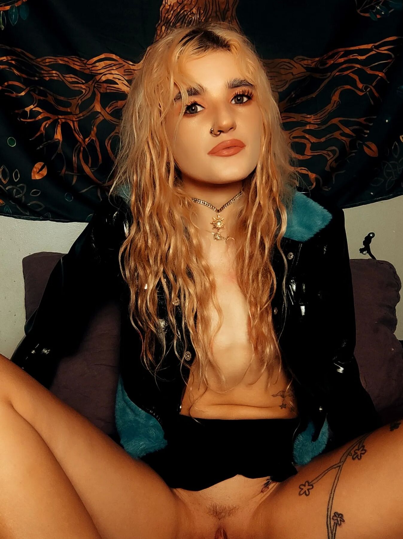 Blondie taking off her panties and bra. Wears a tiny skirt