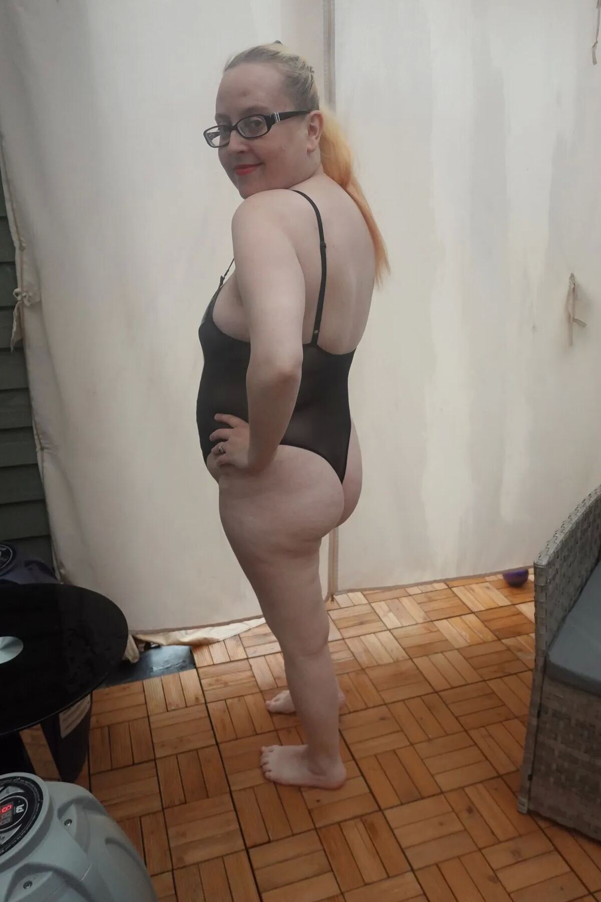 Wife posing in PVC Bodice