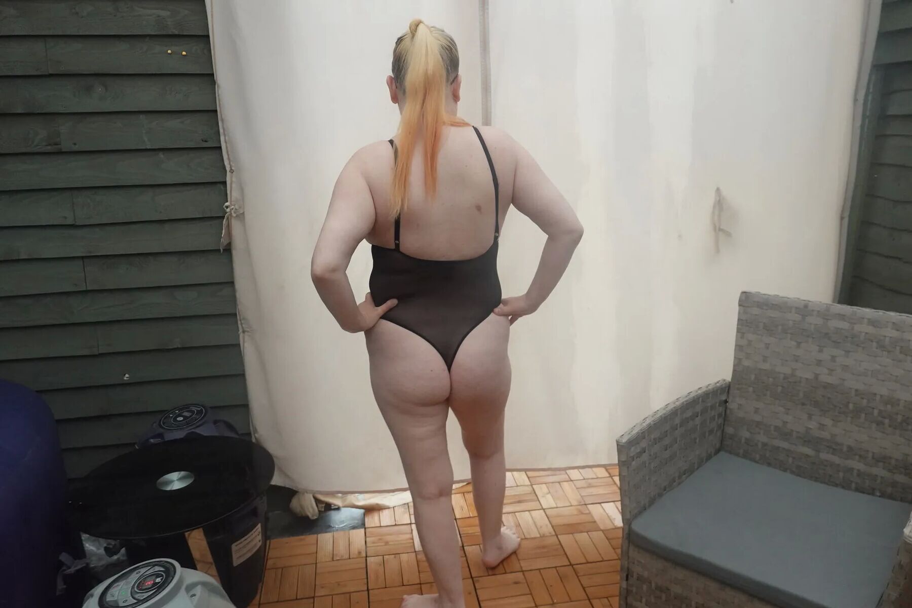 Wife posing in PVC Bodice