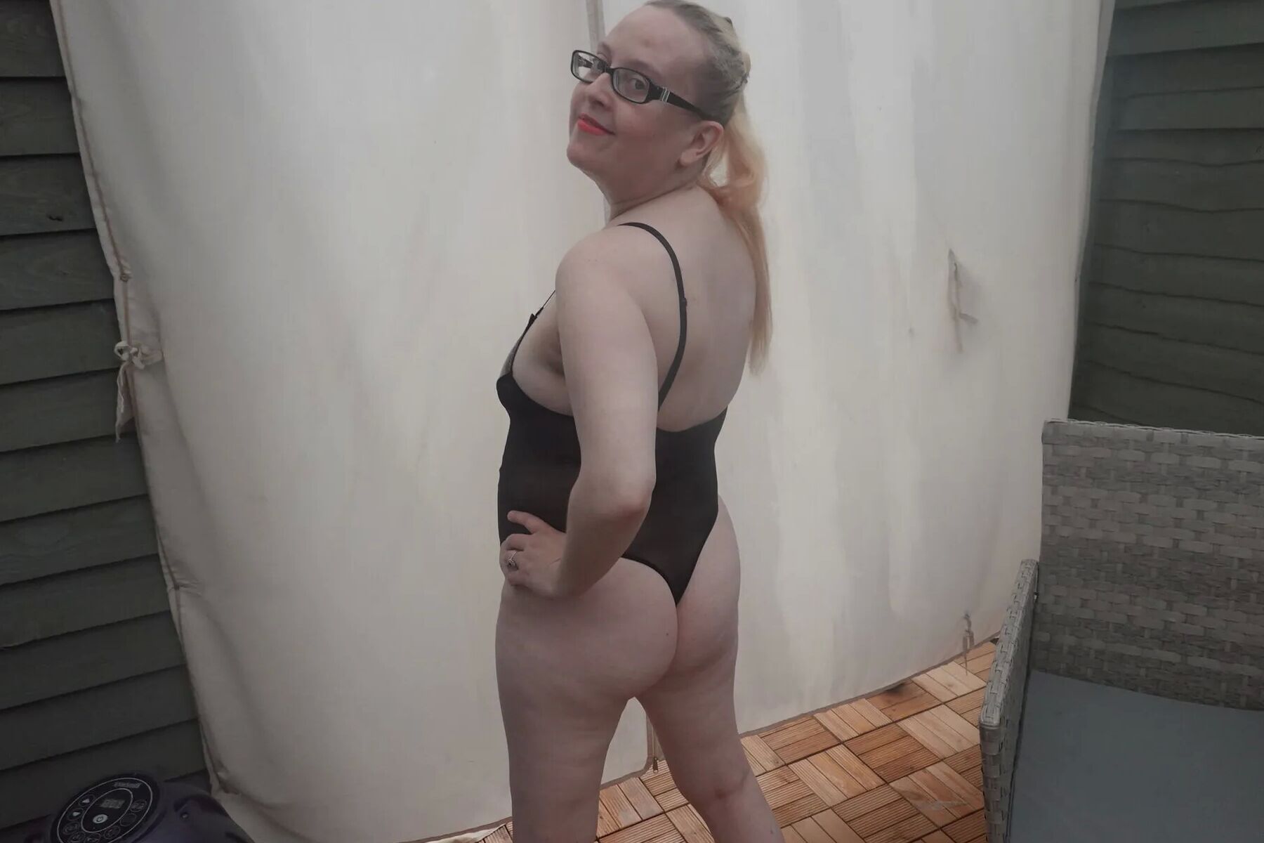 Wife posing in PVC Bodice