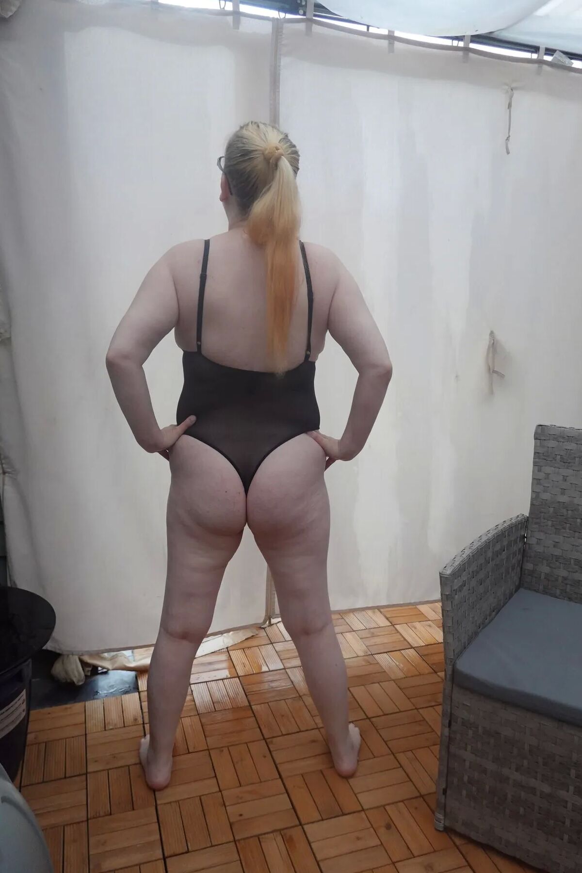 Wife posing in PVC Bodice