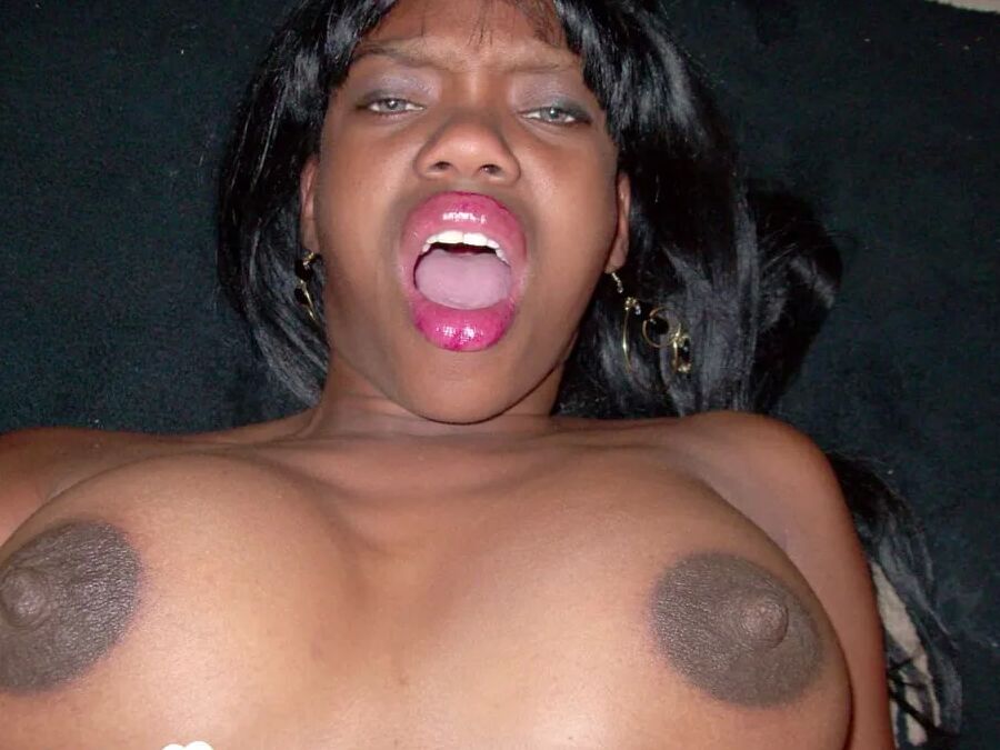 Ebony beauty strips off her fishnet shirt