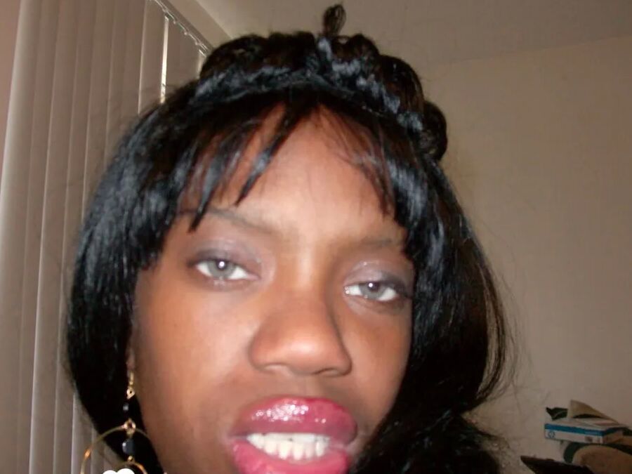 Ebony beauty strips off her fishnet shirt