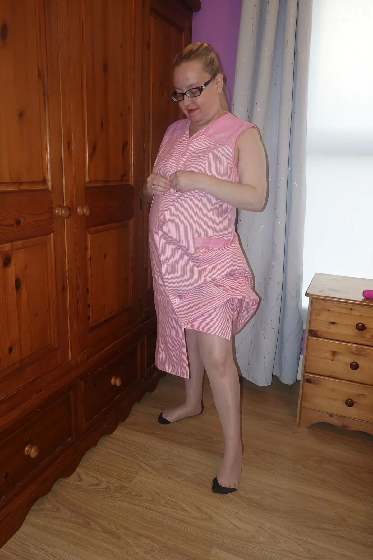 Nylon stockings and suspenders with smock