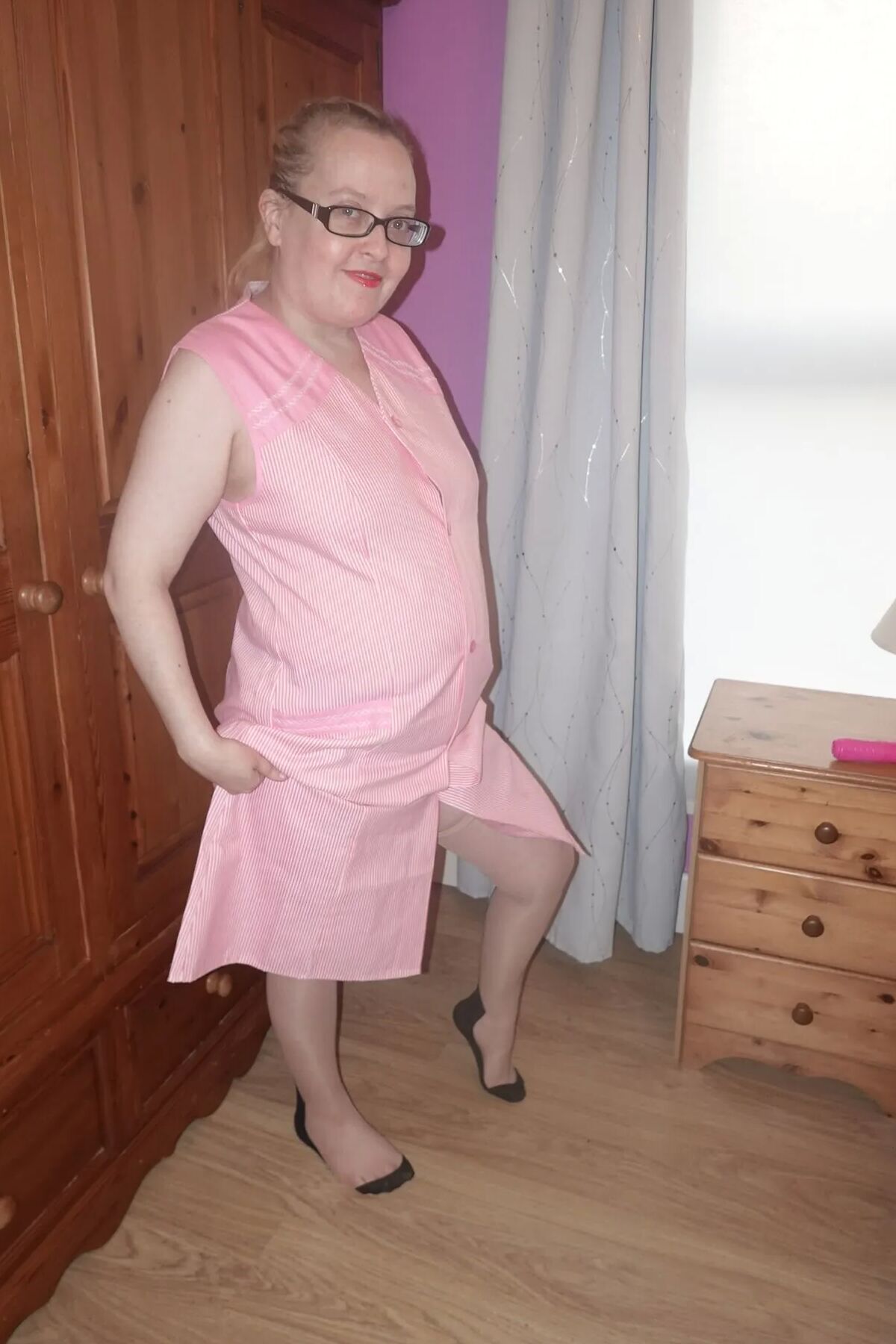 Nylon stockings and suspenders with smock