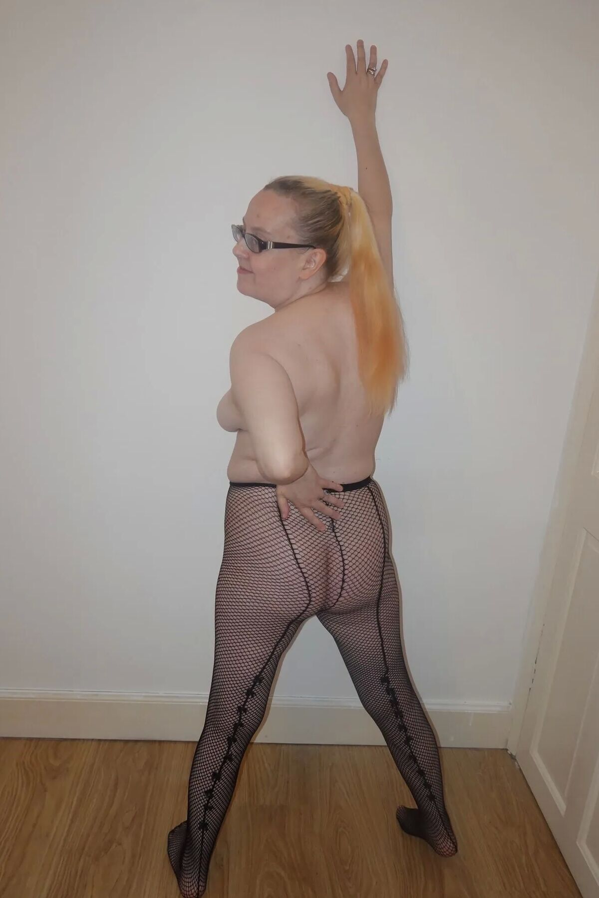 MILF in Fishnet Pantyhose