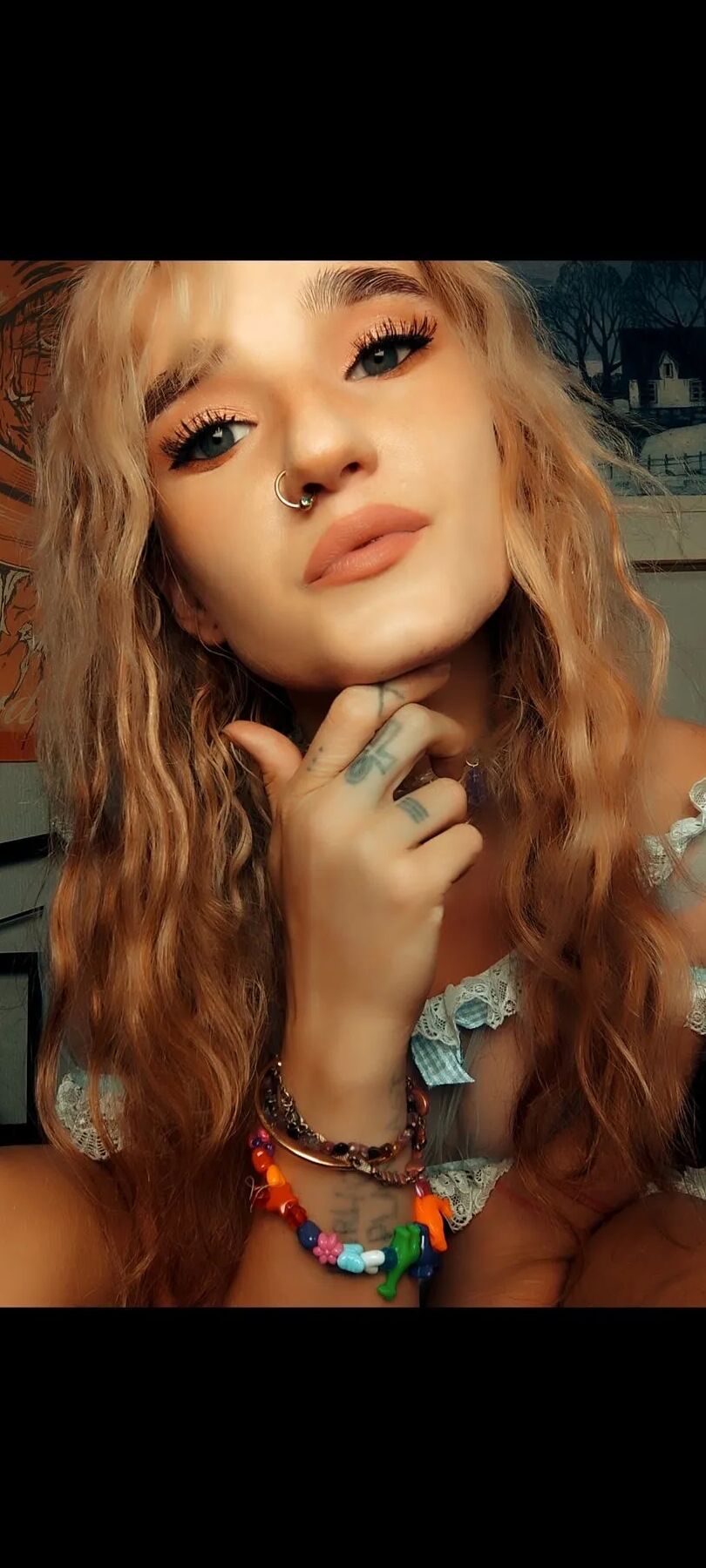 Moonchild spreading her legs in a see-through thong