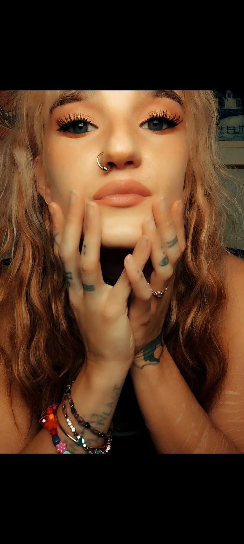Moonchild spreading her legs in a see-through thong