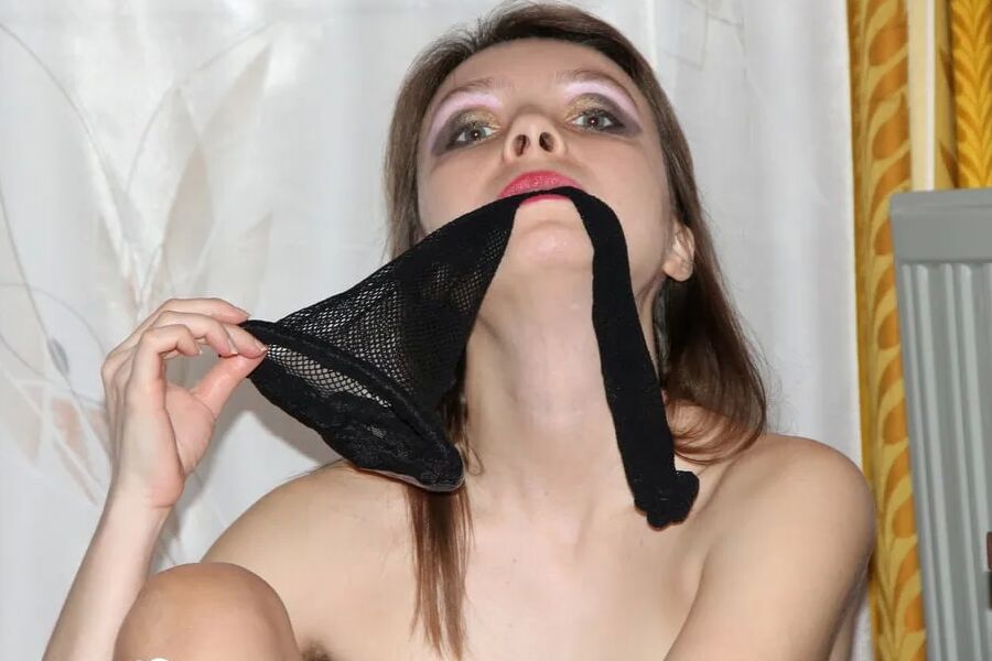 Kinky stepsister in fishnets uses a toy